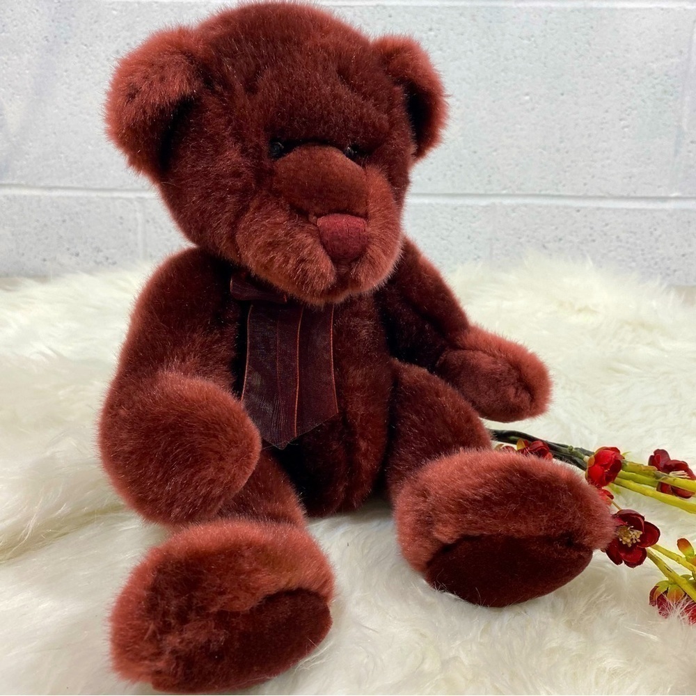 Burgundy teddy bear with bow​​​​​​​​​​​​​